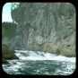 Colour image of water and rock cliff